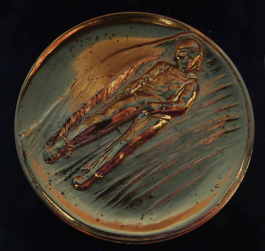 M wie … Medaille